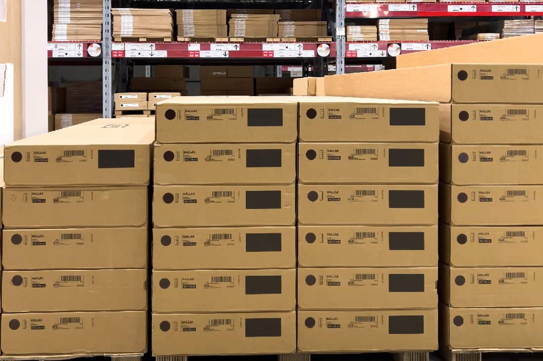Vertical image of Ikea Kallax cardboard boxes in the warehouse