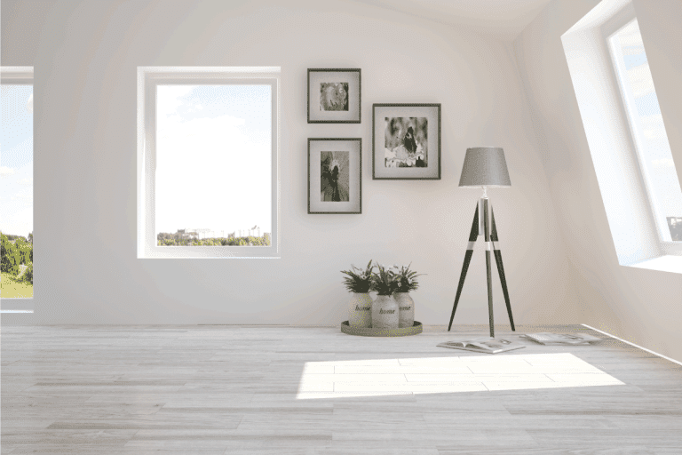 White living room interior with lamp and green landscape in picture window. Do Picture Windows Open