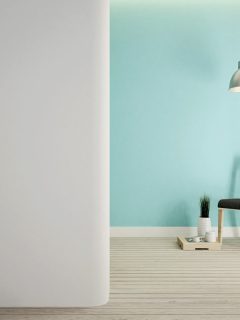 living room and balcony on green tone in apartment or hotel, How To Tone Down White Furniture [With Styling Tips For Your Home]