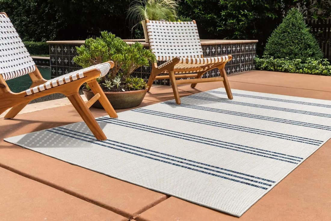 modern outdoor area rug carpet summer time hot day on backyard