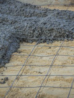 pouring concrete to the road., How To Tell If Concrete Is Too Wet