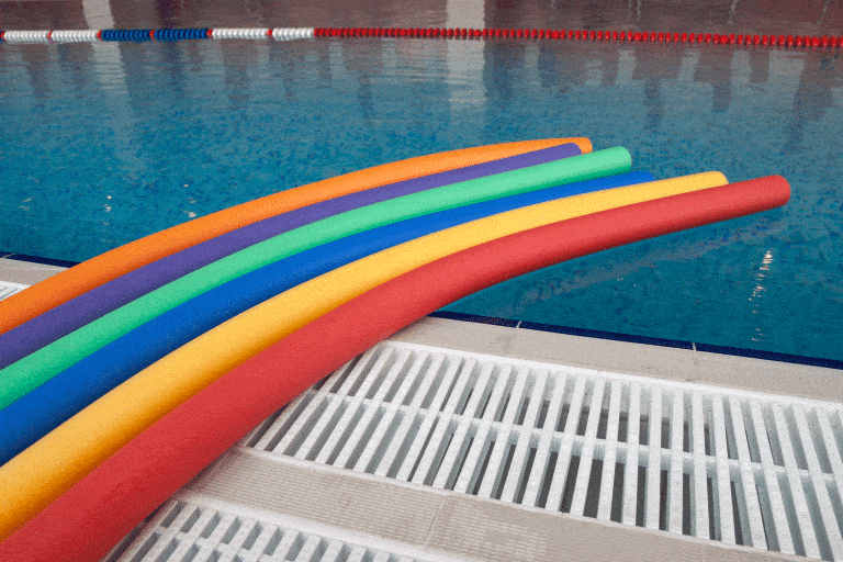 water aerobic equipment. colored aqua noodles in swimming pool, Can You Spray Paint Pool Noodles [And How To]