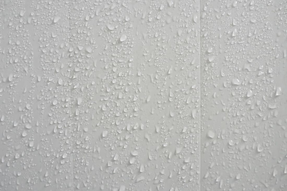 water drops on whit pvc sheets and panels on the wall