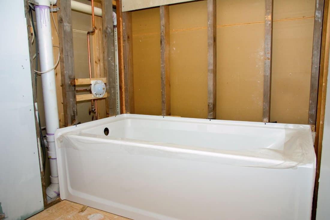 A new bathtub ready to be installed for a bathroom remodeling project.
