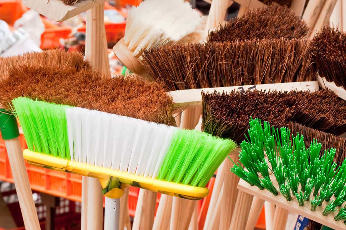 Colorful broom heads for cleaning the popcorn ceiling