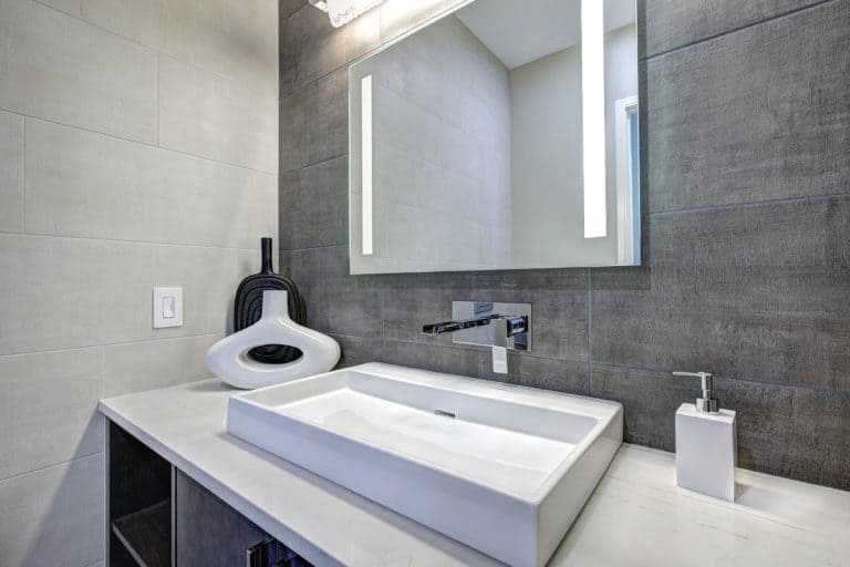 Contemporary bathroom interior with tile wall surround in grey tones., Are Bathroom Mirrors Magnetic?