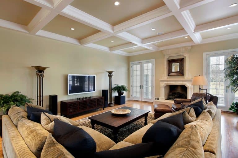 Family room in luxury home with fireplace, What Color Goes With Benjamin Moore White Sand?