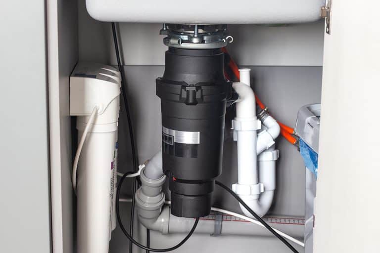 Garbage disposal under the sink, How To Reset A Moen Garbage Disposal [Step By Step Guide]