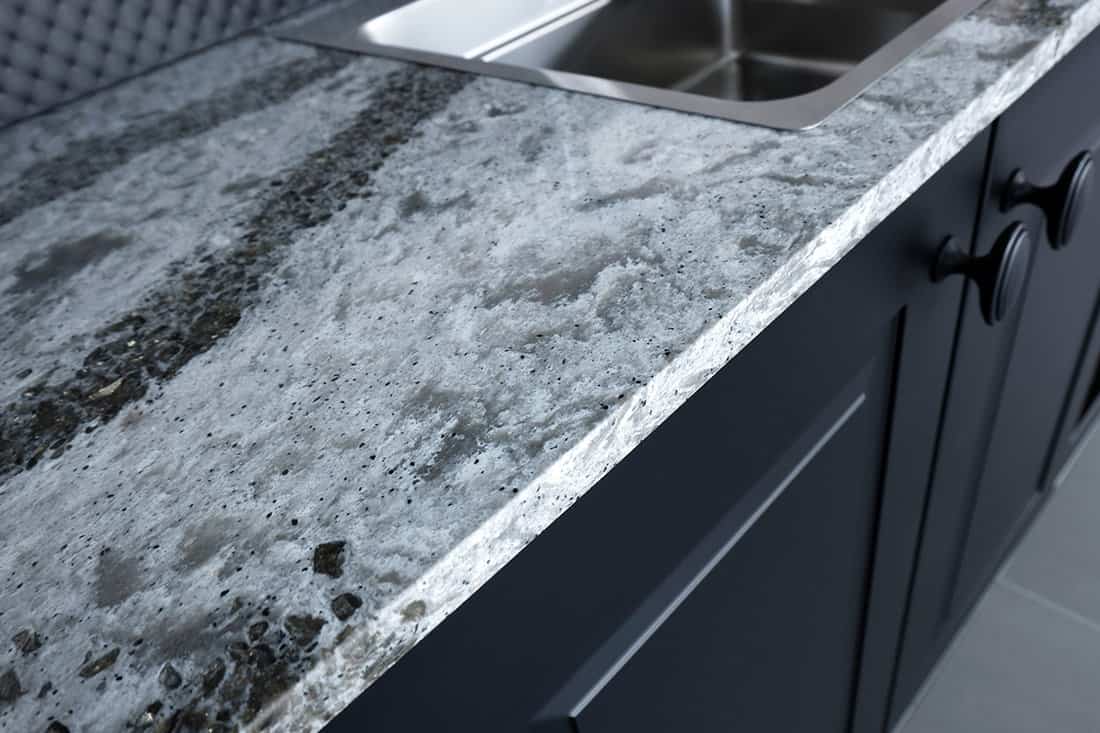Quartz counter worktop with beautiful pattern and stainless steel sink