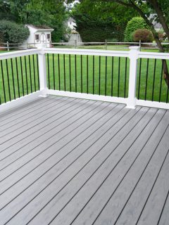 Residentail Backyard with Gray Deck, Can You Power Wash A Trex Deck? [Read This First!]