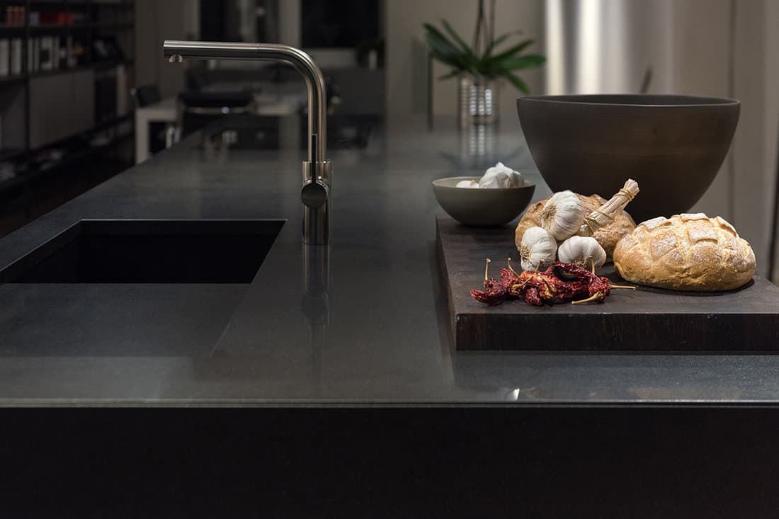 Stylish kitchen with black granite stone worktop
