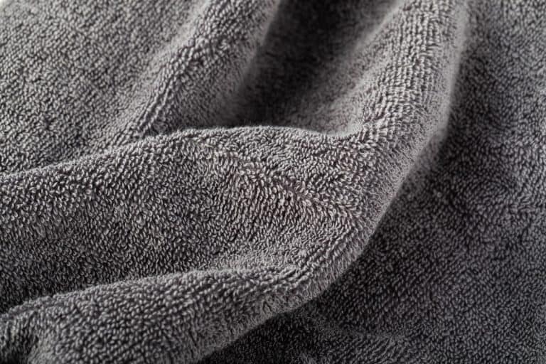 Up close photo of a gray towel, Why Are Your Gray Towels Turning Orange? [6 Possible Reasons!]