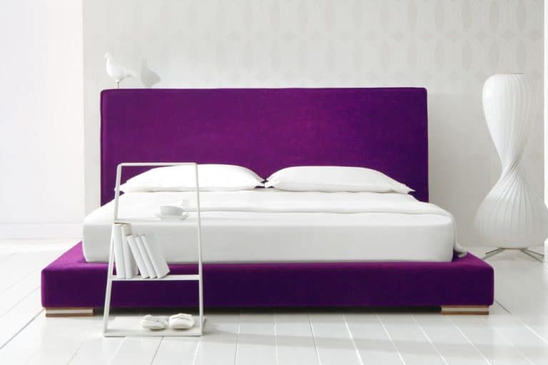 A white minimal bedroom with purple bed, Do Purple Mattresses Sag?
