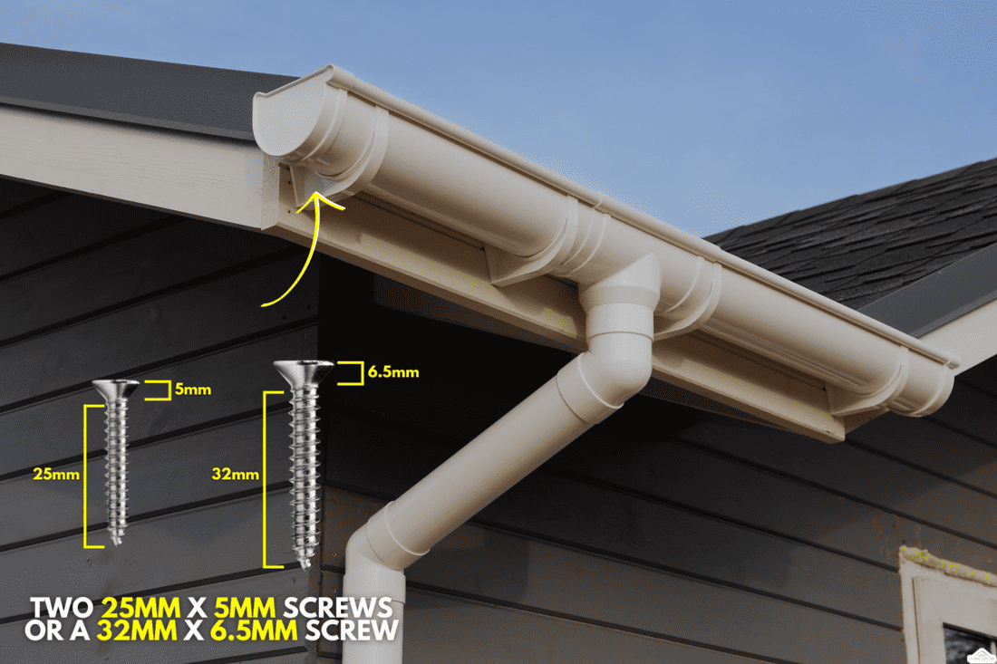 White gutter on the roof top of house, How Many Screws Per Gutter Bracket