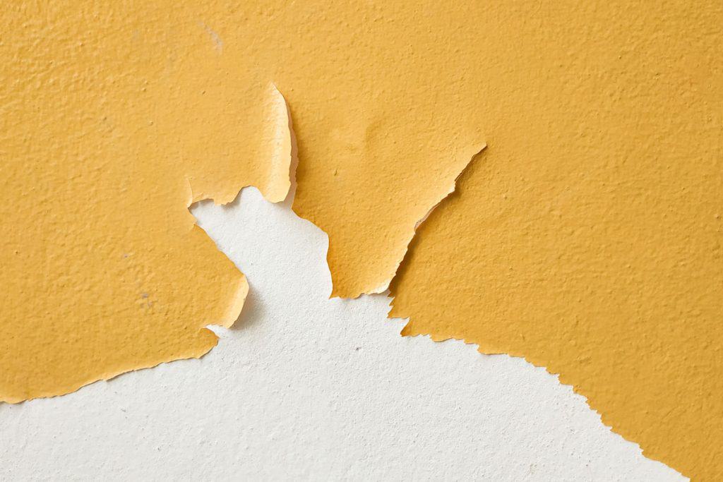 Yellow paint stripping away