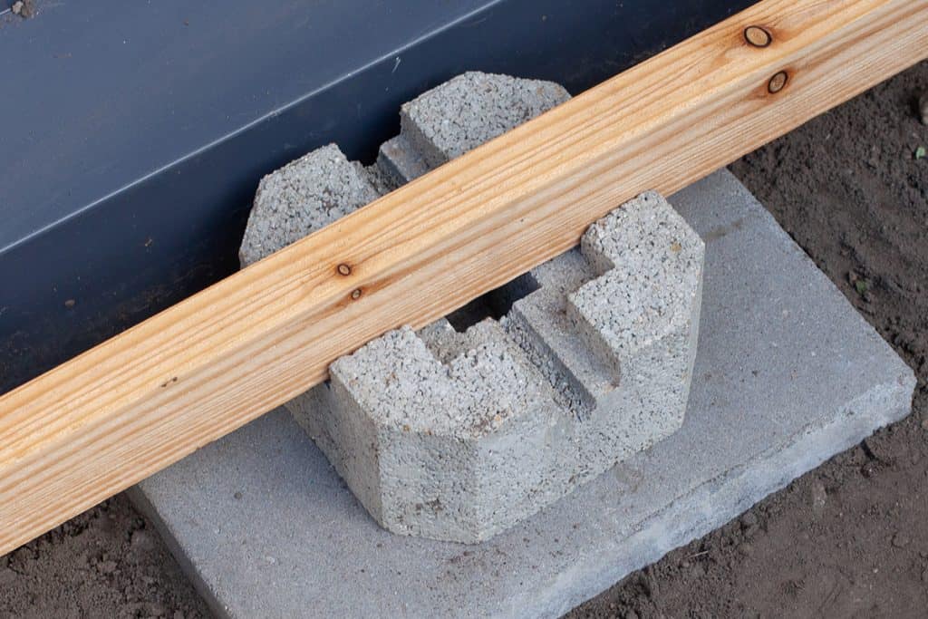 cement deck block foundation installed on the ground