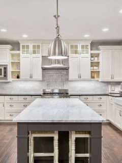 kitchen interior in new luxury home, What Granite Goes With Alabaster Cabinets