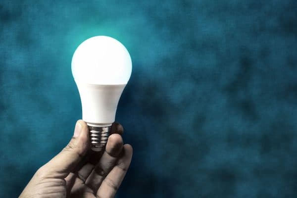 Innovation or Creative concept Hand holding light bulb, Can I Make My Smart Lights Flash?