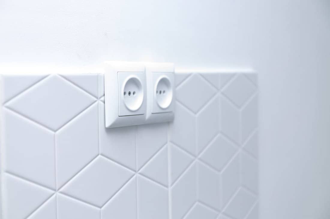 Safety of electrical wiring in the bathroom. Moisture-proof electrical outlet