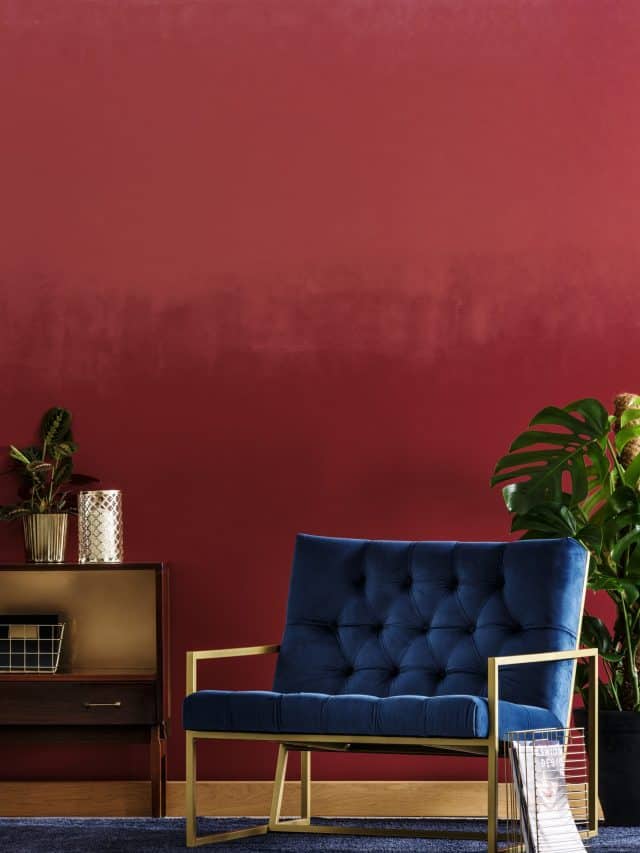 Blue,Armchair,Set,On,A,Red,,Ombre,Wall,Between,A