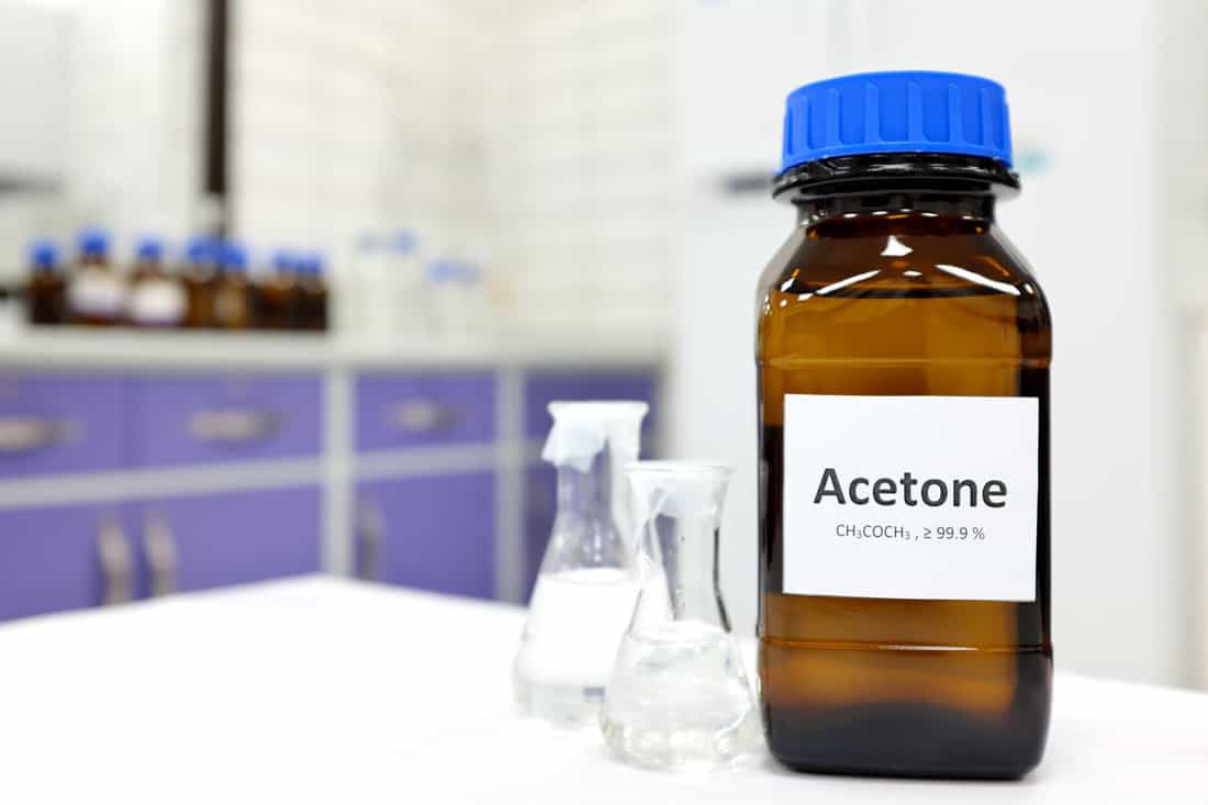 selective focus pure acetone solution brown