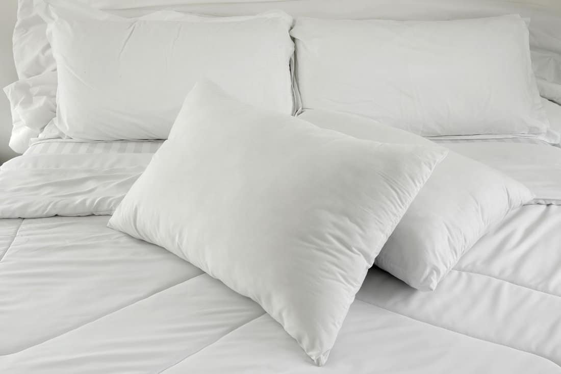 white pillows on bed comfortable soft