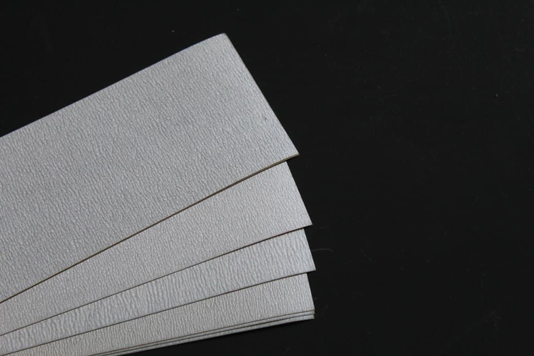 Sandpaper is a tool used for sanding wood surfaces or furniture. to make the wood smooth and beautiful 