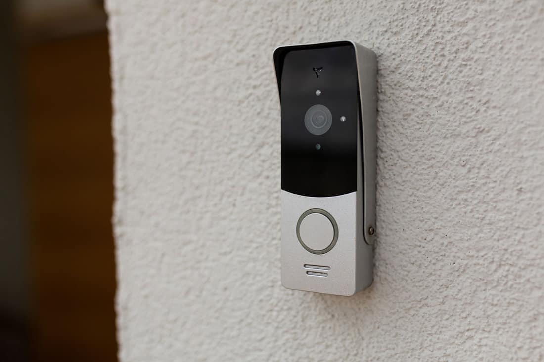 Up close photo of a modern door bell, How To Remove A Wyze Doorbell