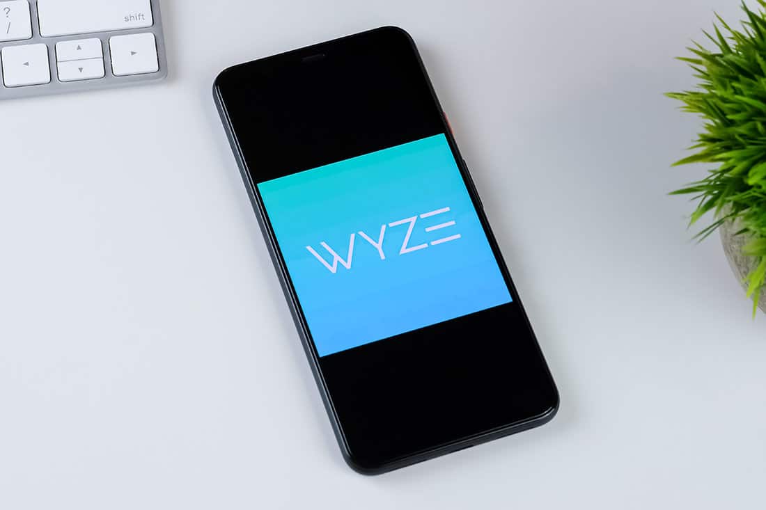 Wyze app logo on a smartphone screen