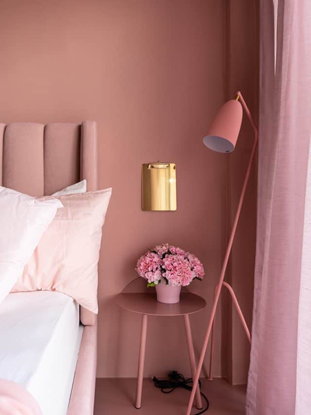 Cozy pink bedroom corner with baby pink velvet fabric bed decorated by blanket, What to Put in an Empty Corner of the Bedroom?