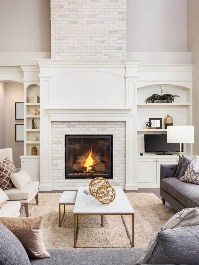 Beautiful living room interior with hardwood floors and fireplace in new luxury home.