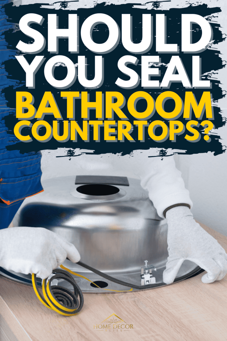 a specialist in protective clothing, glues a sealing tape to eliminate moisture between the countertop and the metal sink, Should You Seal Bathroom Countertops?