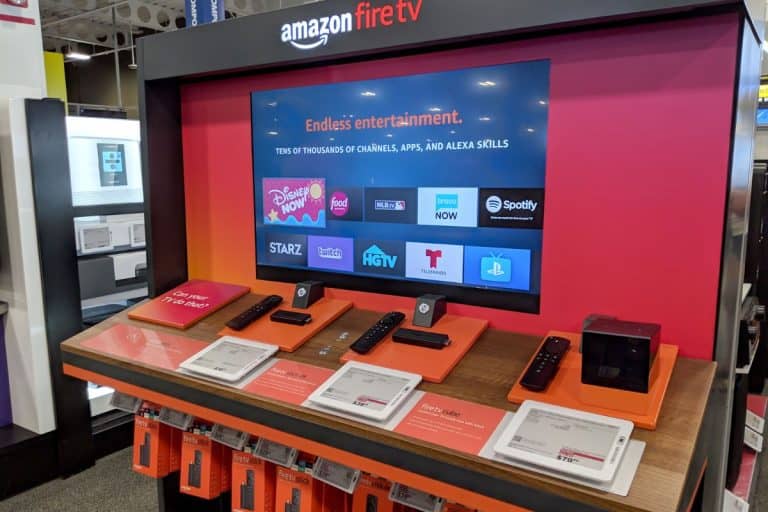 Amazon Fire TV Display inside Best Buy Store. Amazon Fire TV is a digital media player and its microconsole remote developed by Amazon. The device is a streamer. - Smart TV Vs. Fire TV: What's The Difference?