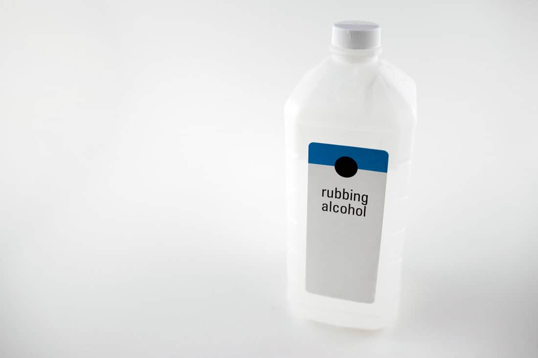 Rubbing alcohol bottle isolated with a white