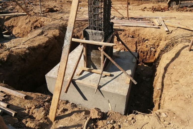 Concrete footings and reinforcing rod for new building under construction, The concrete formwork and reinforcement steel for construction foundation. - How Deep Should Footings Be?