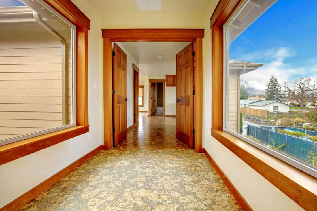 Large hallway in empty house with cork floor