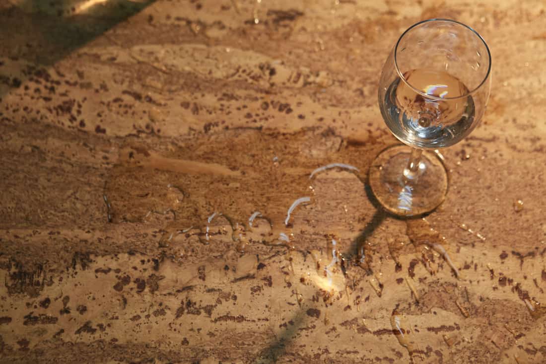 glass tableware cork background water on the floor