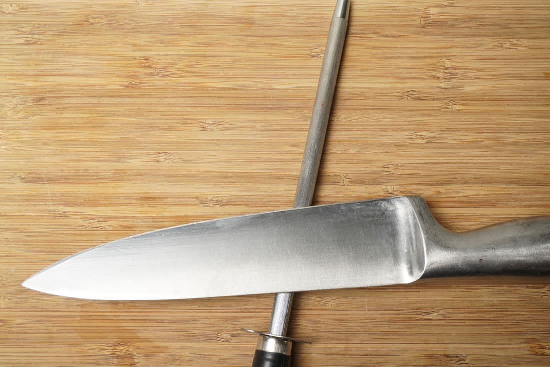 A stainless steel knife and sharpener