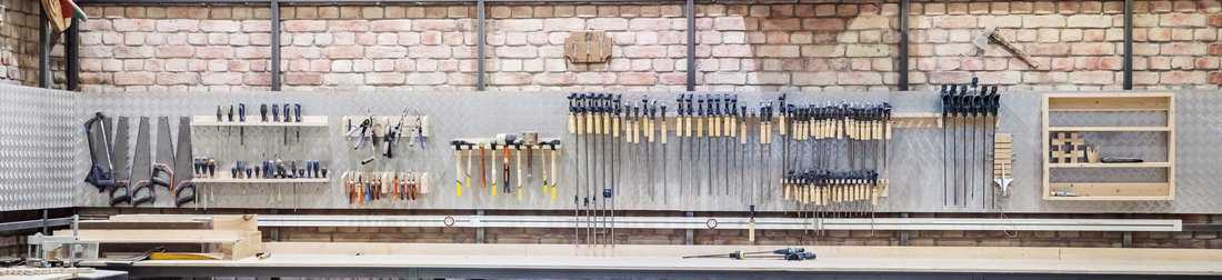 Garage tools hanged on the garage shelves