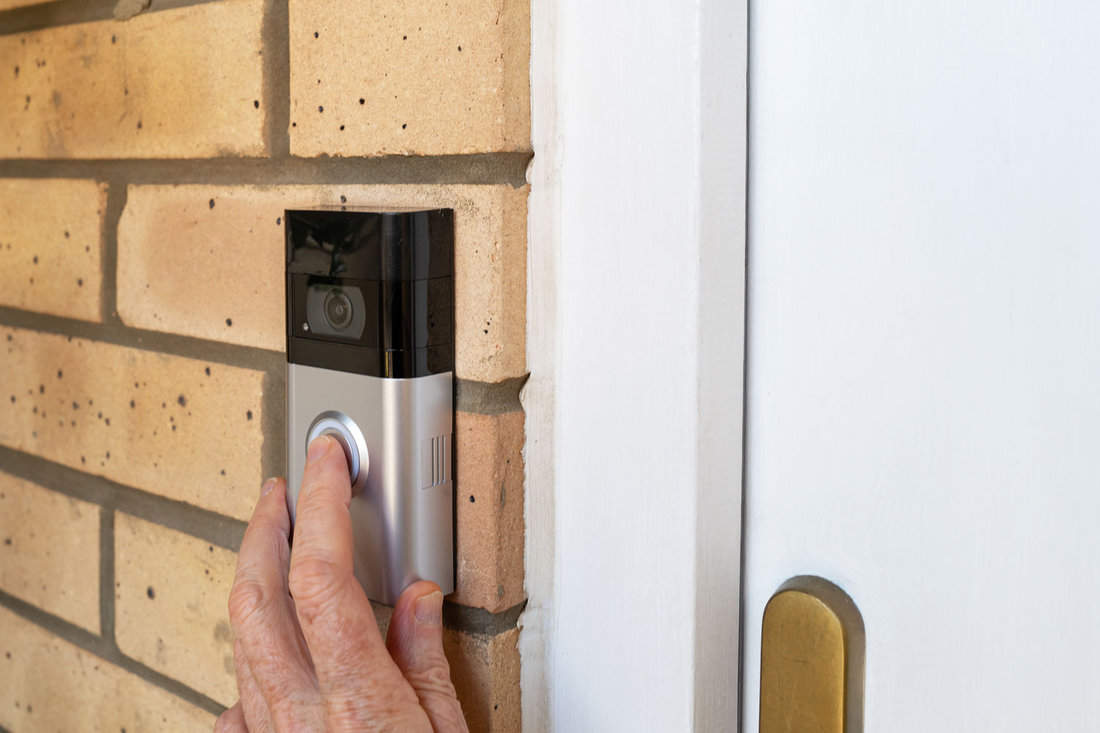 A visitor at a private residence was observed pressing the button of a Smart Wireless Doorbell located by the front door, but it did not ring.