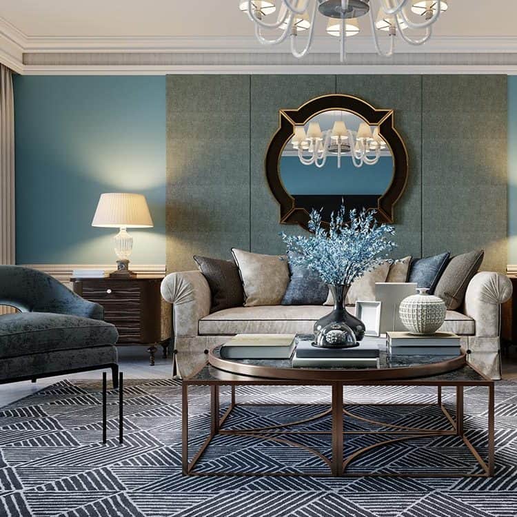 Living room interior in classic  style with a greige sofa and  blue armchair. Light blue walls and black and white rug with geometric pattern