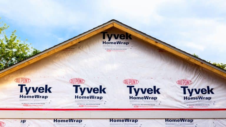 The residence's outer surface enveloped in pristine Tyvek home wrap - Is Tyvek House Wrap Waterproof?