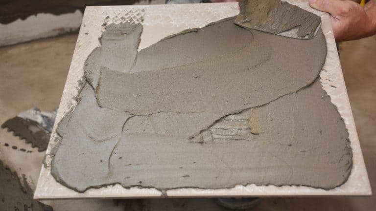 Tile setter applying thinset to a single tile, Will Thinset Stick To Formica [Answered] - 1600x900