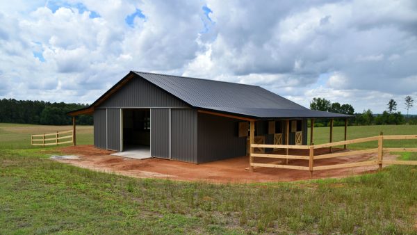 A black pole barn in an isolated area - 1600x900