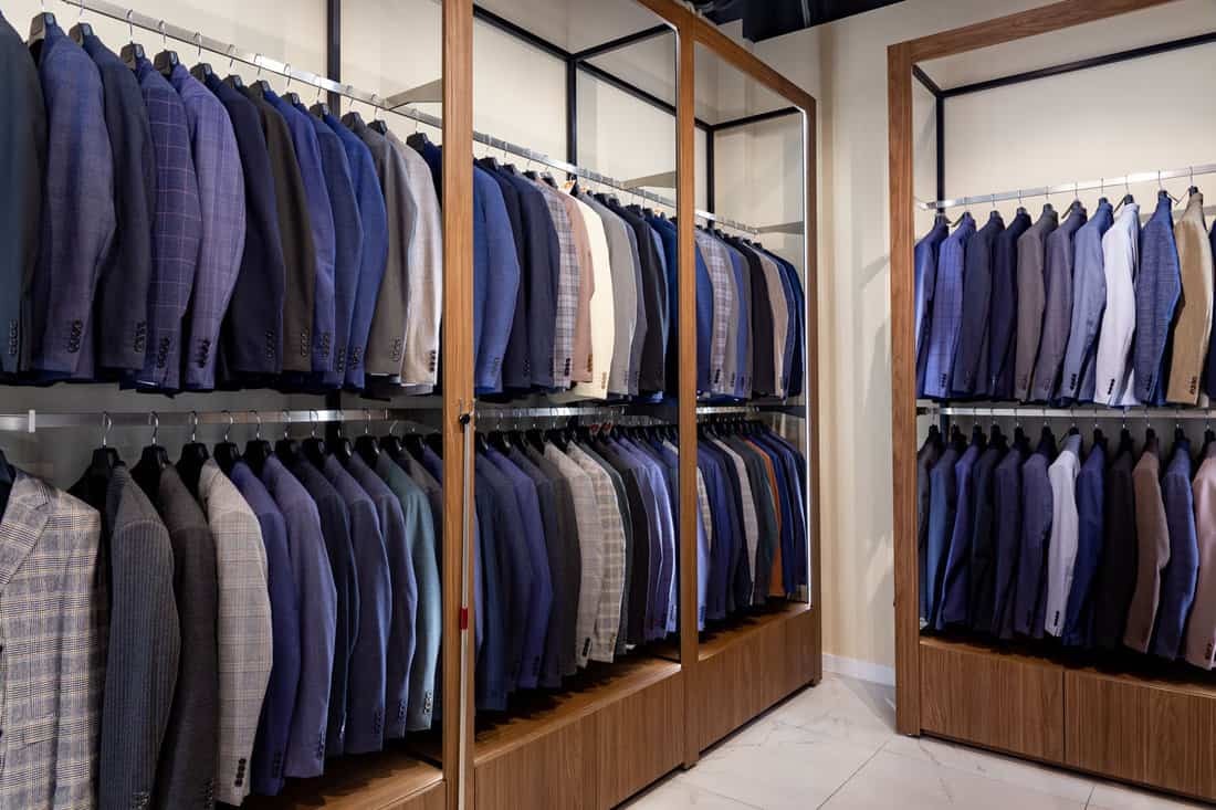 Hanged clothes inside a modern closet
