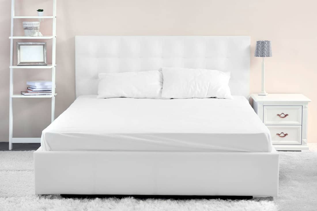 Sleep number bed with white beddings