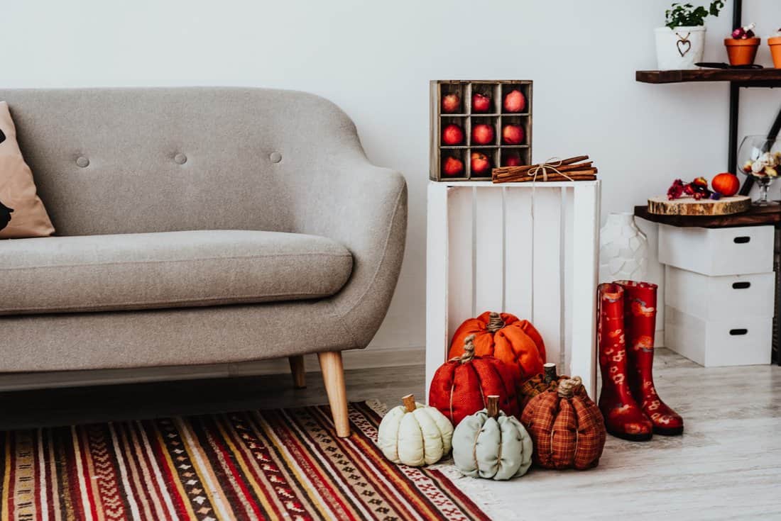  fabric pumpkins, a crate of apples, and ready-for-adventure boots.
