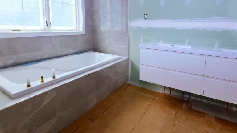 Interior of a bathroom with an unfinished wall, Can Tub And Tile Paint Be Tinted? - 1600x900