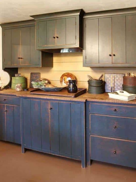 Colonial style farmhouse kitchen in washed blues and greens