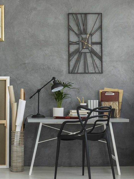 Home office of an architect with dark gray walls